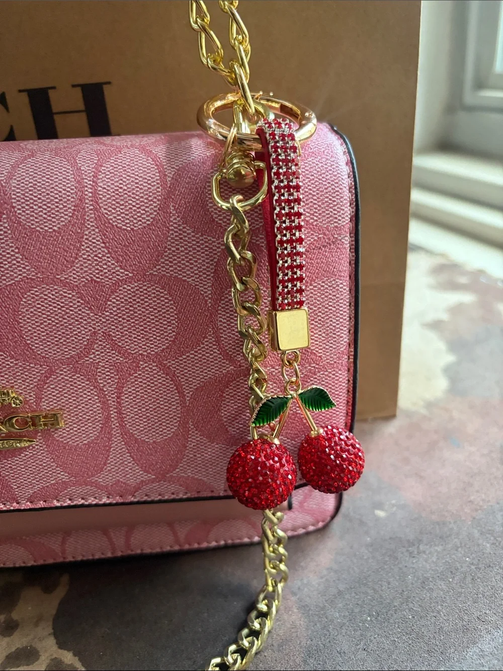 Coach Pink Signature Crossbody Bag with Gold Chain & Cherry Charm
